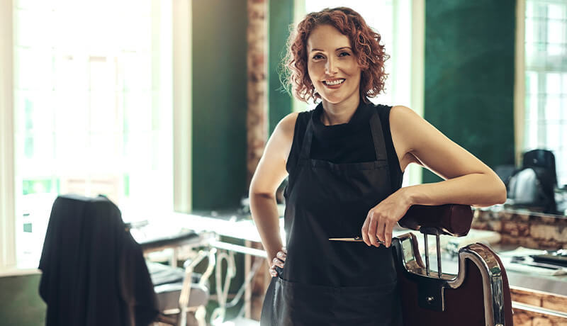 A stack of perfectly folded, fresh white towels representing the professional quality customers receive after scheduling their first pickup with the ByNext laundry app.